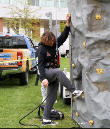 student Rock climbing